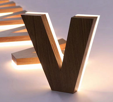 Custom LED Backlit Lettering Signage - SS Wood Texture with Warm LED - Davis Materialworks